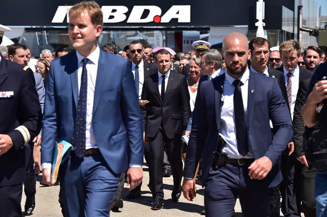 French President Emmanuel Macron (centre) visits the International Paris Air Show on Monday (AFP photo)